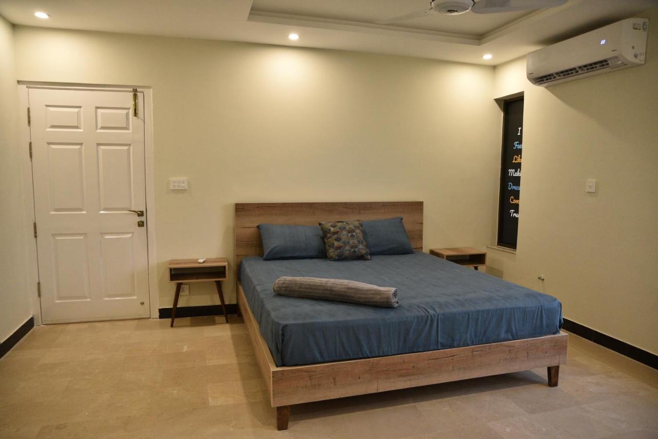 The Bliss Aparthotel Rawalpindi Bagian luar foto