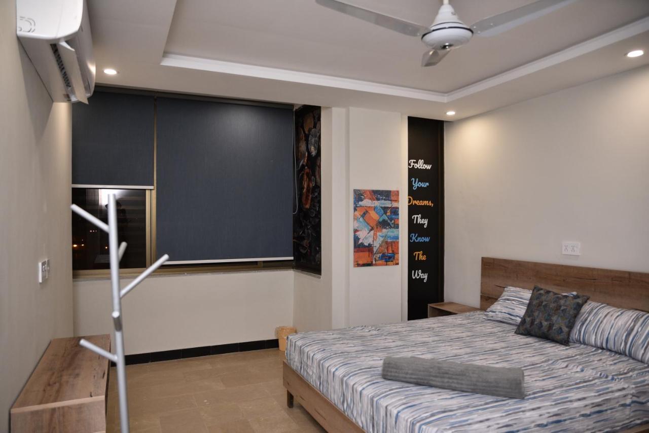 The Bliss Aparthotel Rawalpindi Bagian luar foto