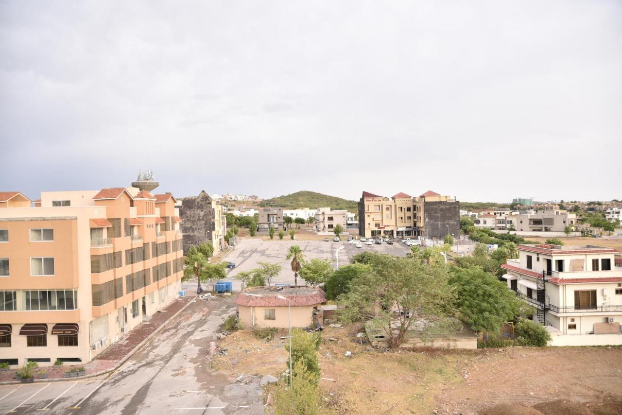 The Bliss Aparthotel Rawalpindi Bagian luar foto
