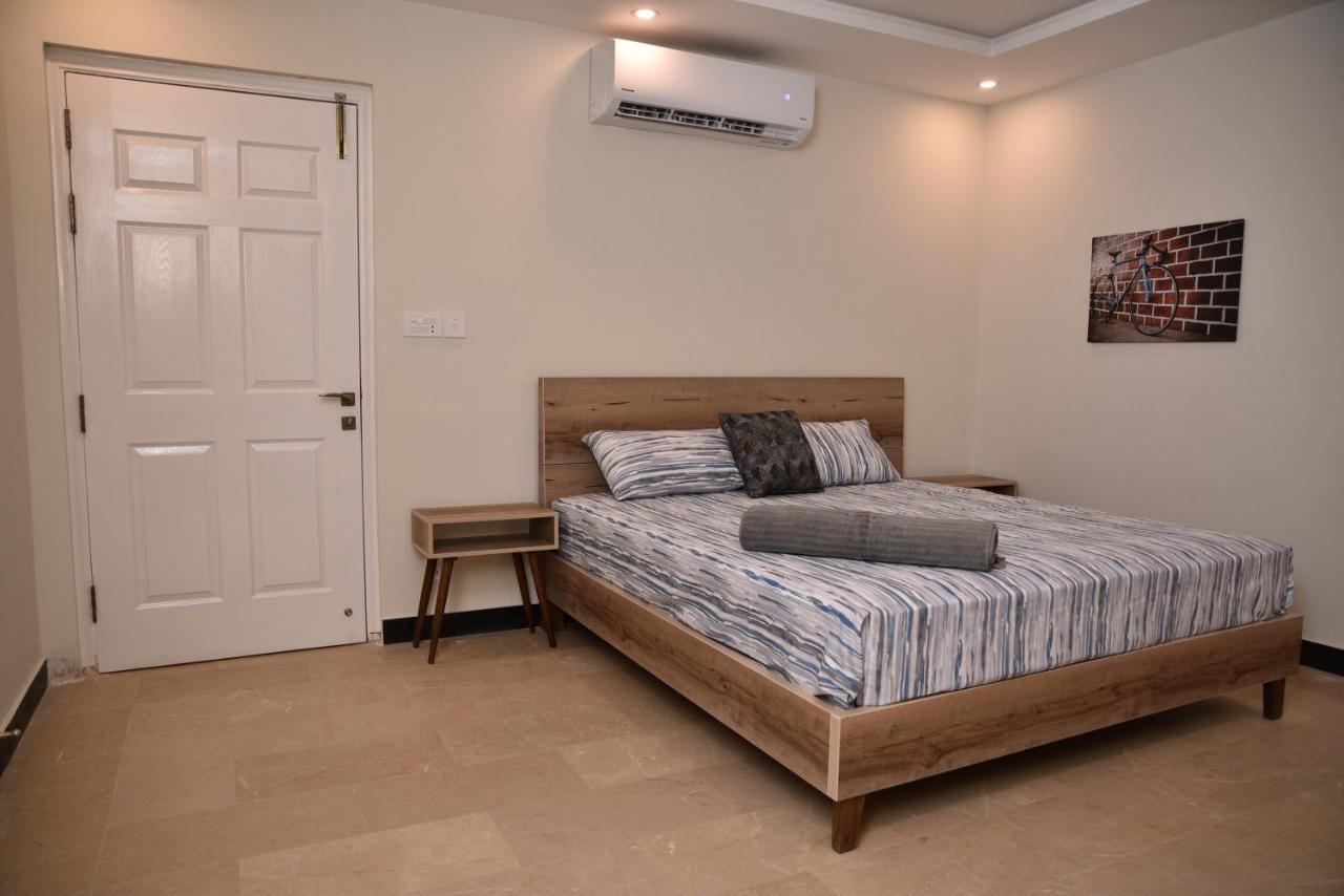 The Bliss Aparthotel Rawalpindi Bagian luar foto