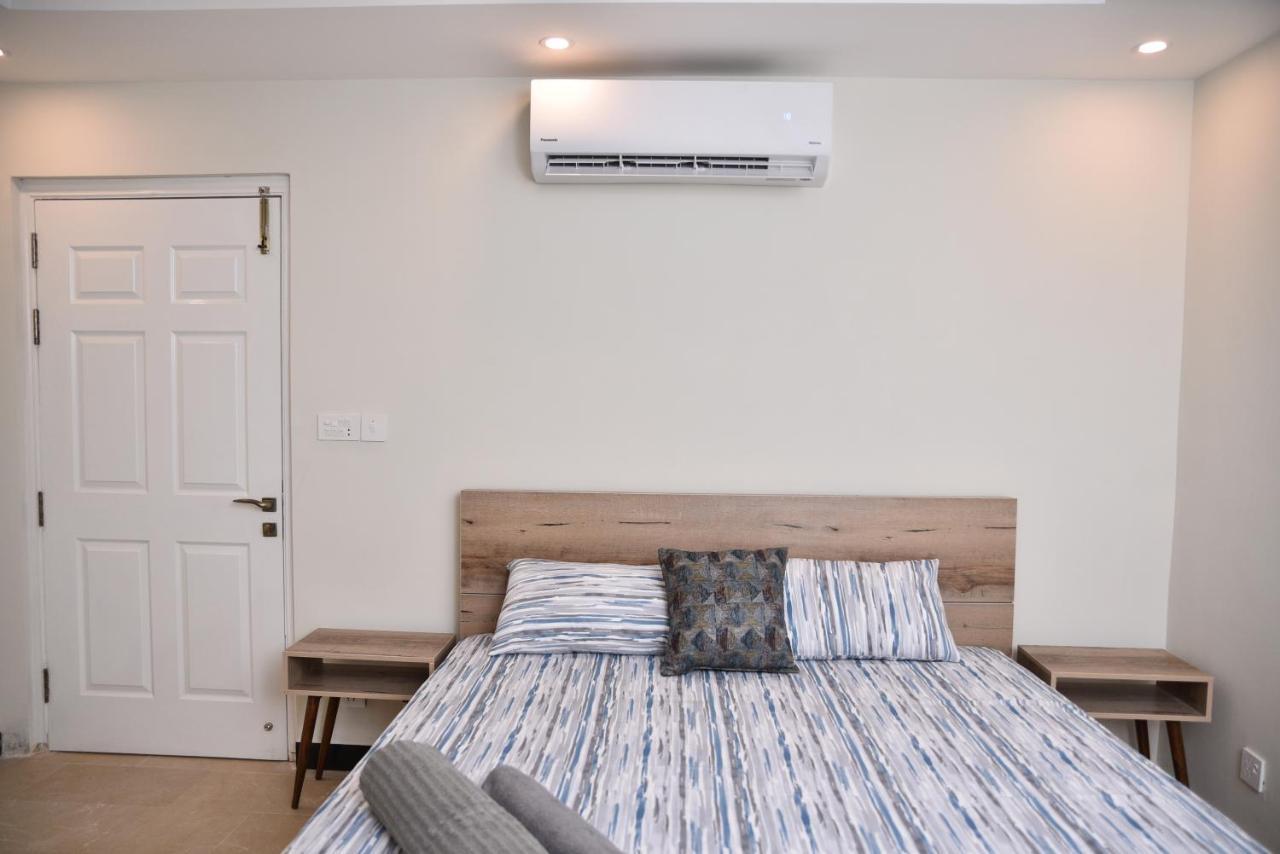 The Bliss Aparthotel Rawalpindi Bagian luar foto
