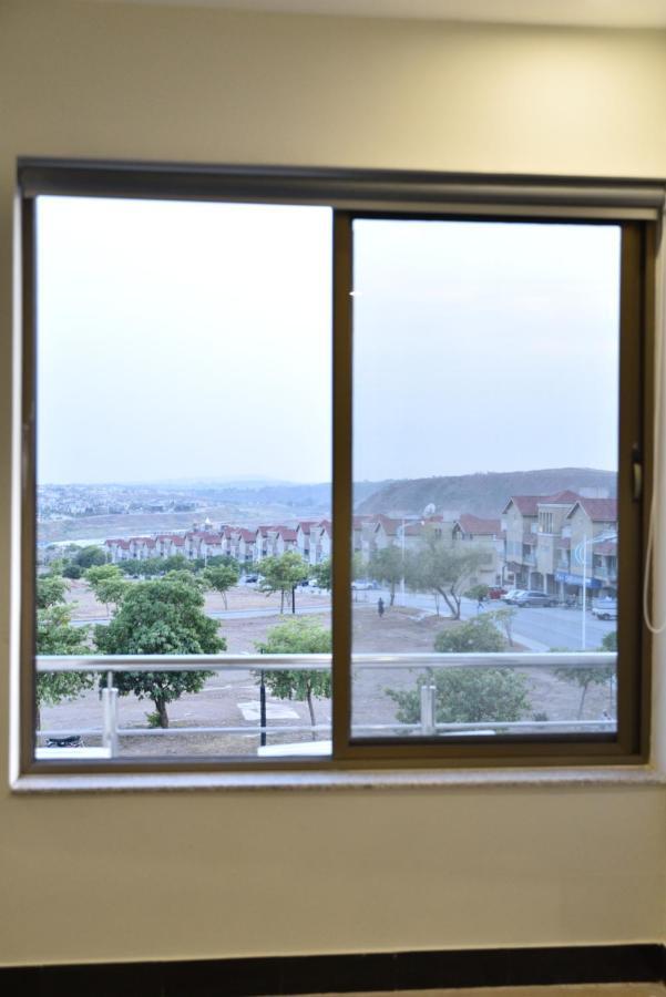 The Bliss Aparthotel Rawalpindi Bagian luar foto