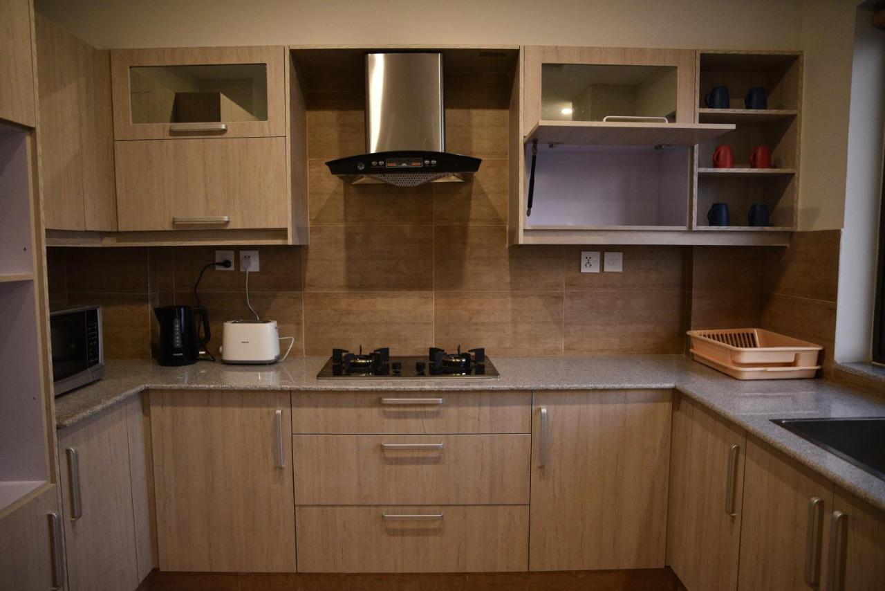 The Bliss Aparthotel Rawalpindi Bagian luar foto